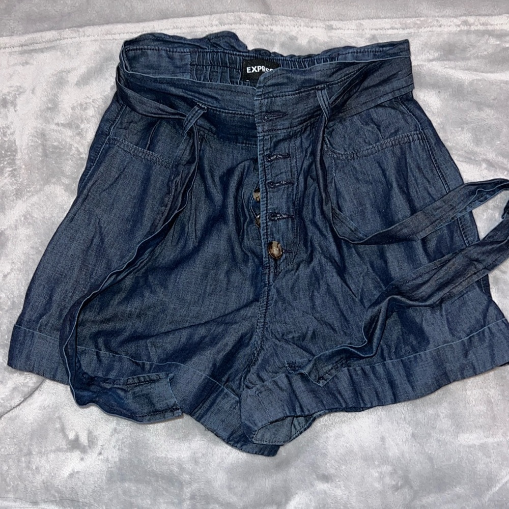 Express shorts, button fly with tie. Denim color